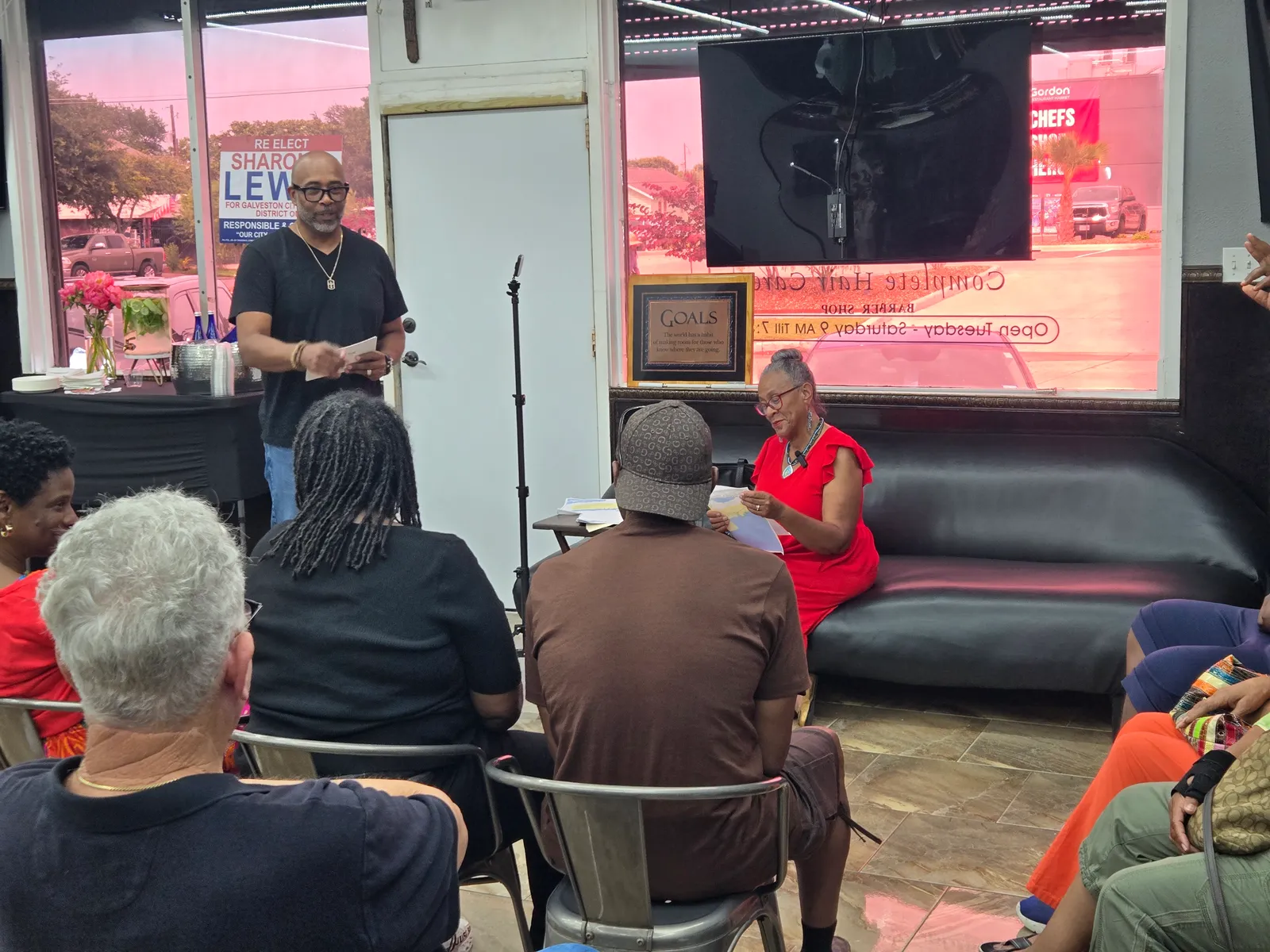 Community gathering hosted inside the barbershop