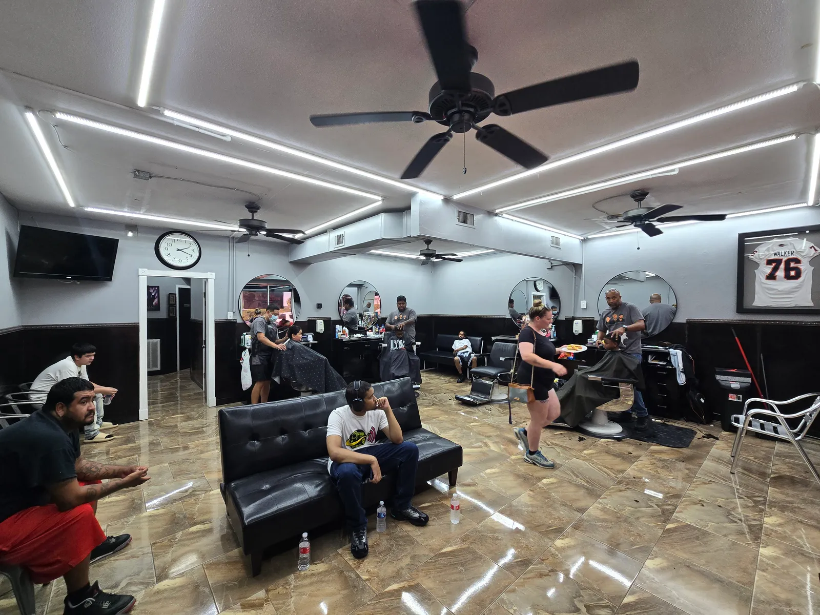 A busy day inside Chris' Platinum Cutz